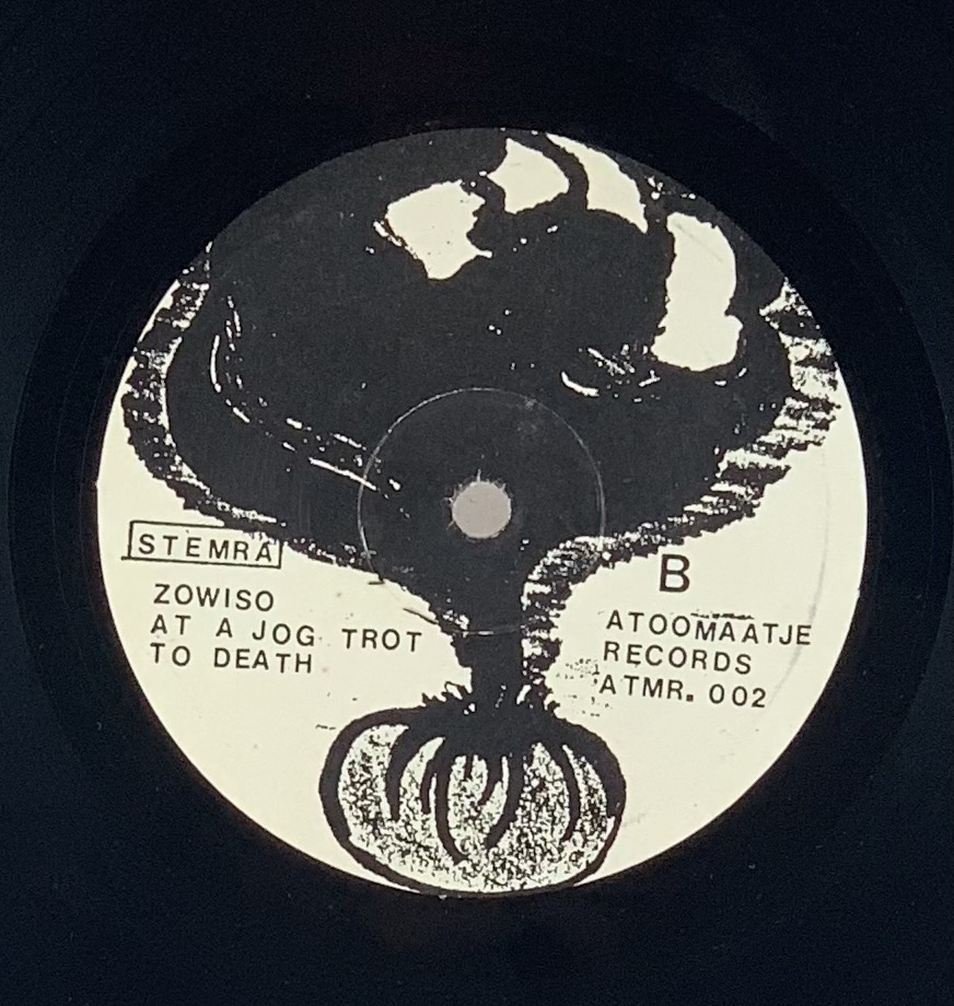 Zowiso - At A Jogtrot To Death (LP usado VG+/VG+)